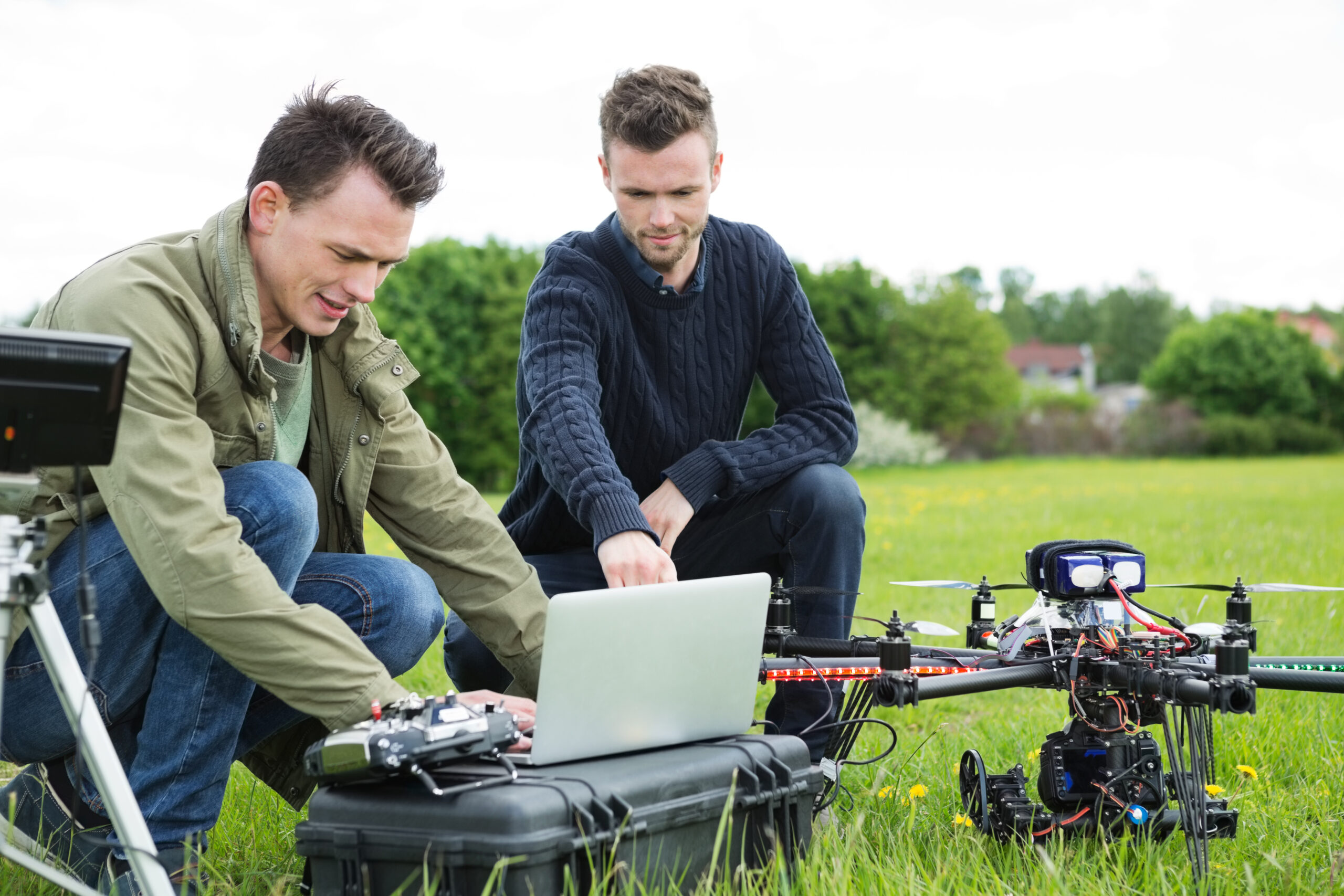 Technicians working on a drone; 